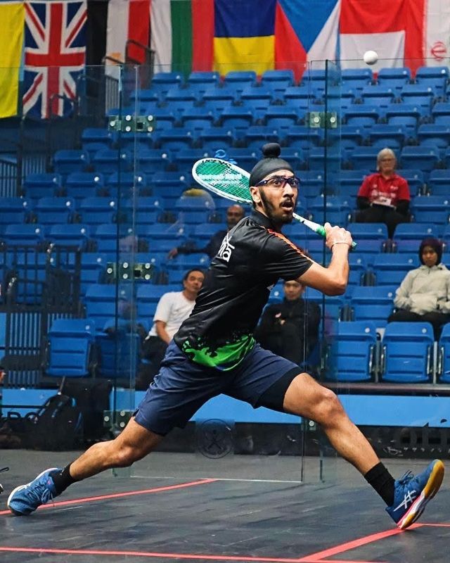 Gurveer Singh playing squash